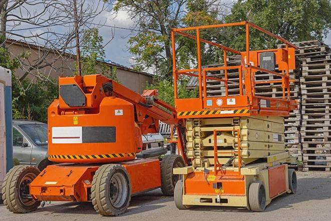 worker using forklift in industrial warehouse in Elk Ridge